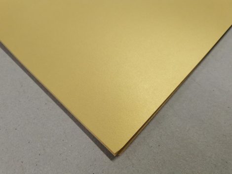 Dekorációs karton anyagában színezett 50x70cm 220gr "'65" arany 25ív/csg